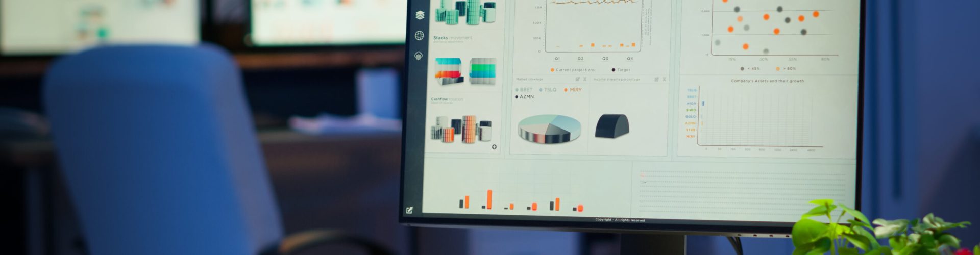 Financial company with nobody in it, place of work startup, workplace indoors concept. Interior of empty start up business office with modern design during night with graphics running on the desktop.